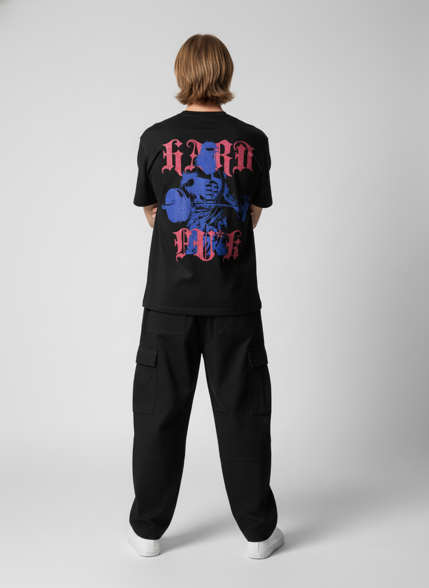 Back pose of the model wearing Strive - Hard As Fu*k - Unisex Marškinėliai