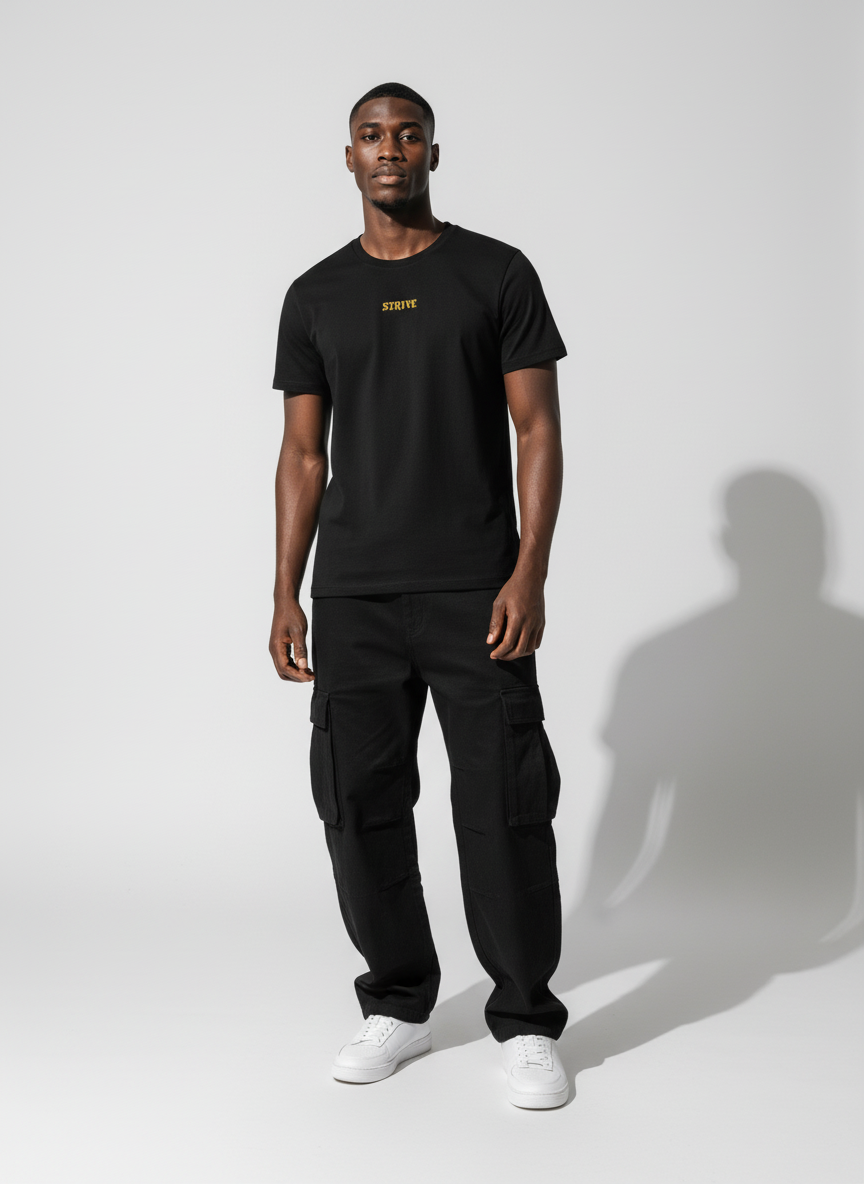 Full body view of the model wearing Strive - Hard As Fu*k - Unisex Marškinėliai