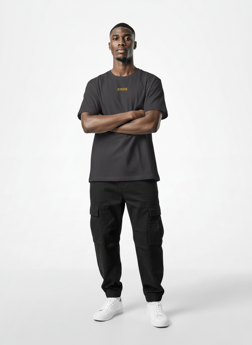 Full body view of the model wearing Strive - Hard As Fu*k - Unisex Marškinėliai