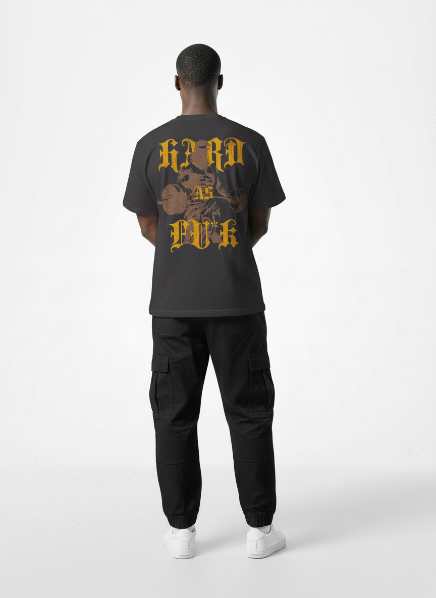 Back pose of the model wearing Strive - Hard As Fu*k - Unisex Marškinėliai