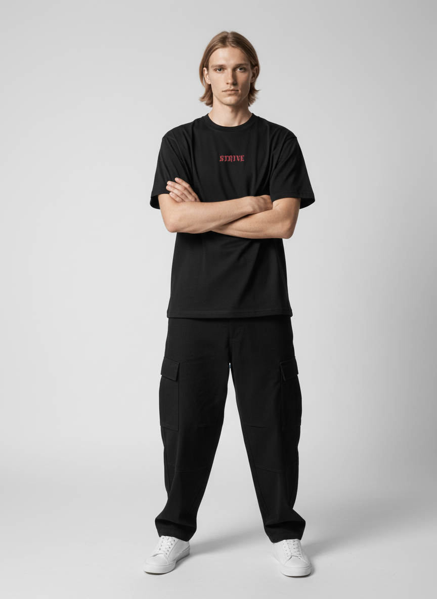 Full body view of the model wearing Strive - Hard As Fu*k - Unisex Marškinėliai